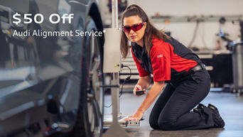 Audi Technician performing an alignment service