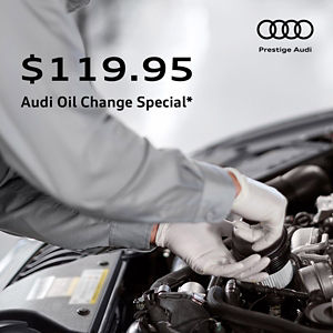 Audi technician installing an oil filter