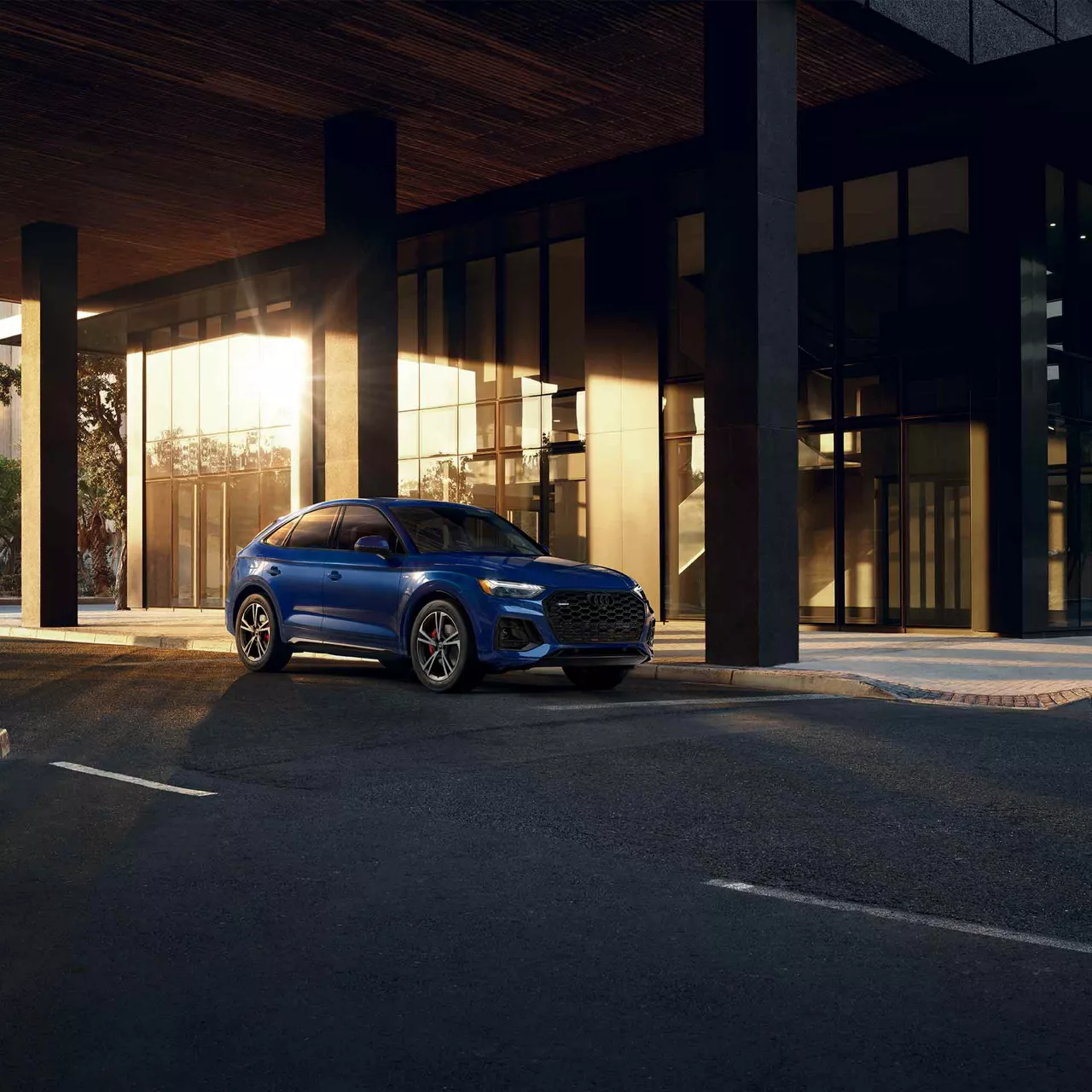 Side view of an Audi parked.