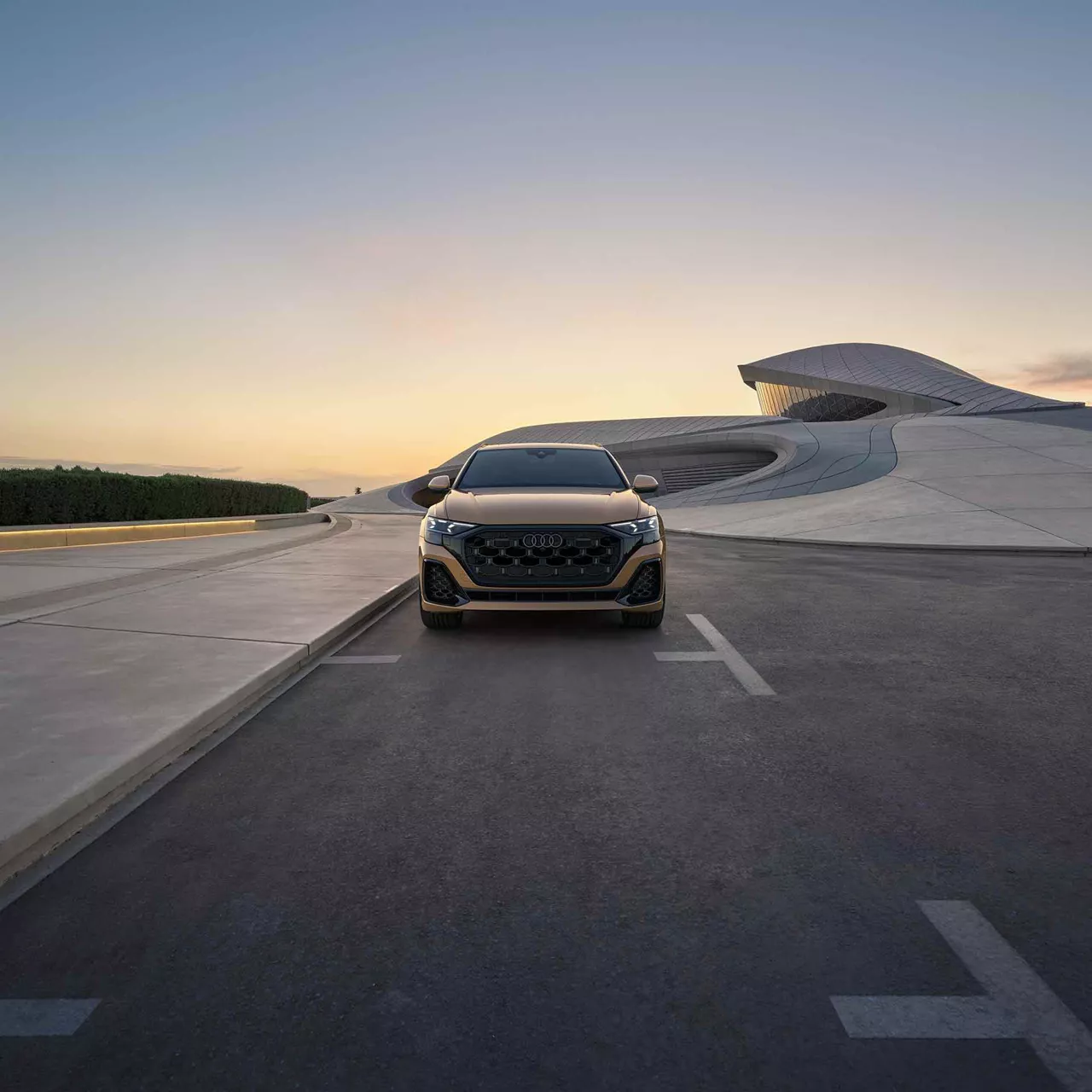 Front view of an Audi driving.