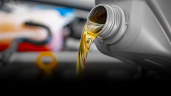 Service technician servicing tire.