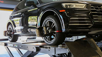 Technician working on car