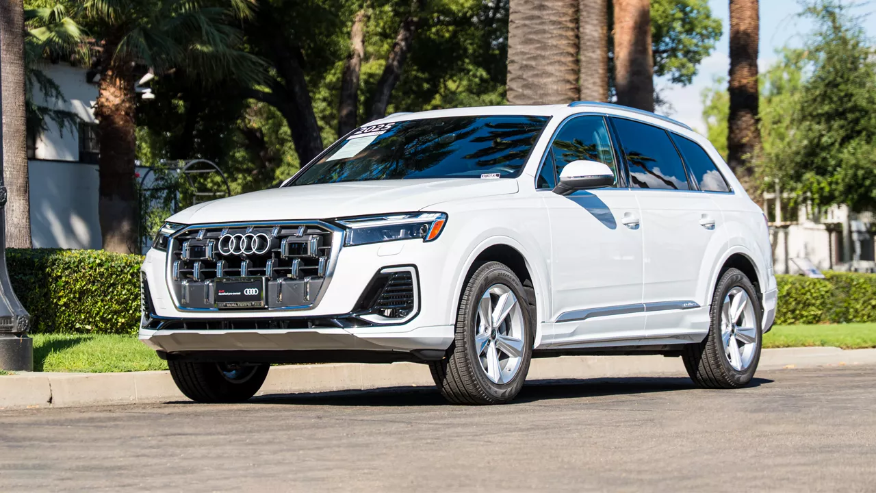 Three quarter view of a Pre-Owned Audi Q7 parked in downtown Ontario.