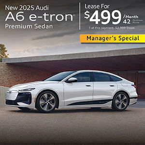 Side view of an Audi A6 e-tron parked. 