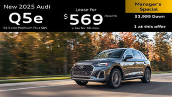 New Audi Q5 e hybrid parked and charging