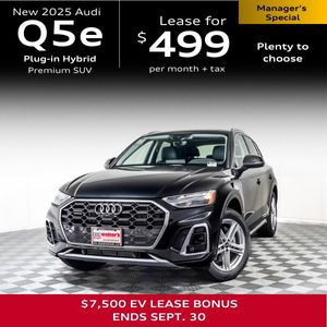 Audi Q5e parked and being charged. 
