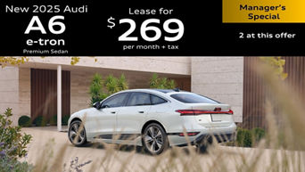 Left side profile of an Audi A6 accelerating.
