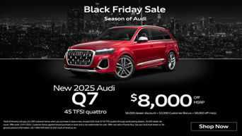 Left side profile of an Audi A6 accelerating.