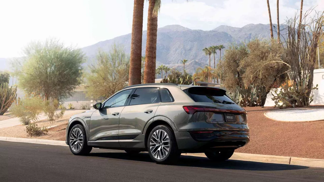 Three quarter view of an Audi Q8 e-tron vehicle parked.