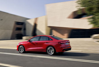 Q6 etron driving on the road 