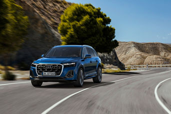 Q6 etron driving on the road 