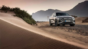 Q8 e-tron side view on the road