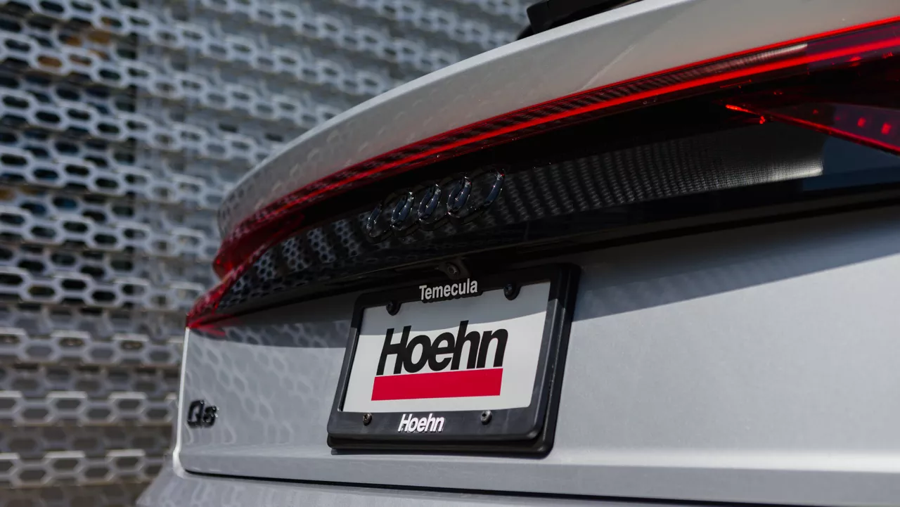 Rear profile view of Audi vehicle. 