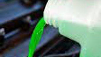 Vehicle coolant liquid being refilled. 