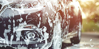 Car undergoing a wash.