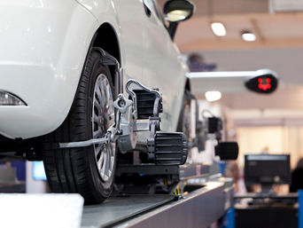 A car undergoing wheel alignment.