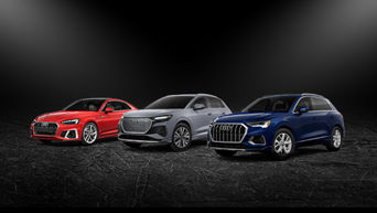 View of an Audi vehicles parked.