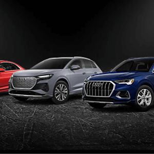 New Audi models lined up next to each other over a black background 