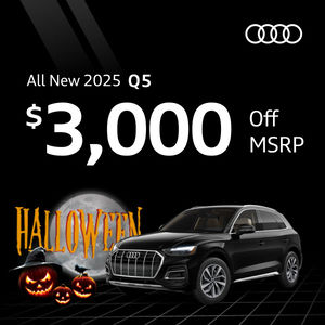 Side view of an Audi Q5 parked.