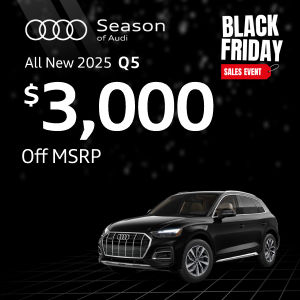 Side view of an Audi Q5 parked.