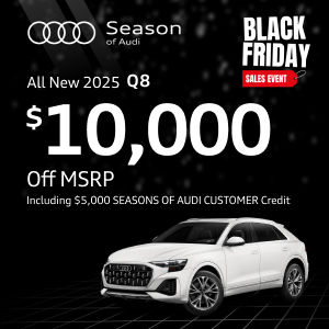 Back view of an Audi Q8 driving.