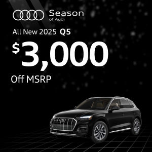 Side view of an Audi Q5 parked.