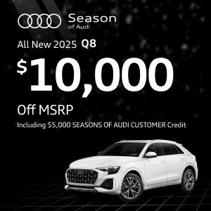 Back view of an Audi Q8 driving.