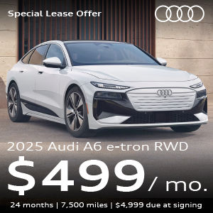 A white A6 Sportback e-tron parked.