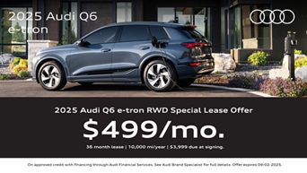 Side view of Q6 e-tron charging.