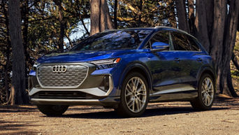 Three quarter view of an Audi q4 e-tron driving