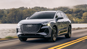 Three quarter view of an Audi q4 e-tron driving