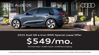 Side view of Q6 e-tron charging.