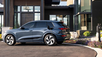 Side view of Q6 e-tron charging.