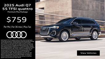 Side view of an Audi Q7 driving