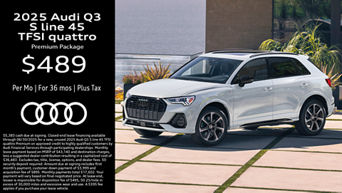 Side view of an Audi Q3 parked.