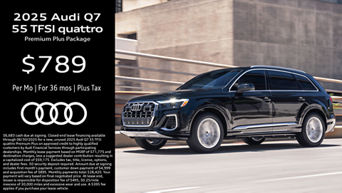 Side view of an Audi Q7 driving