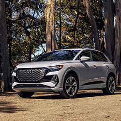 Side view of an Audi Q4 e-tron parked.