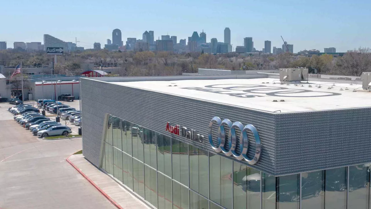 Aerial view of the Audi Dallas dealership building. 