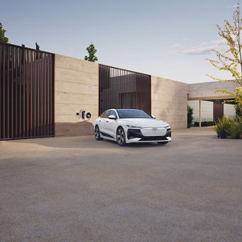 Three-quarter side profile view of an Audi A6 etron parked