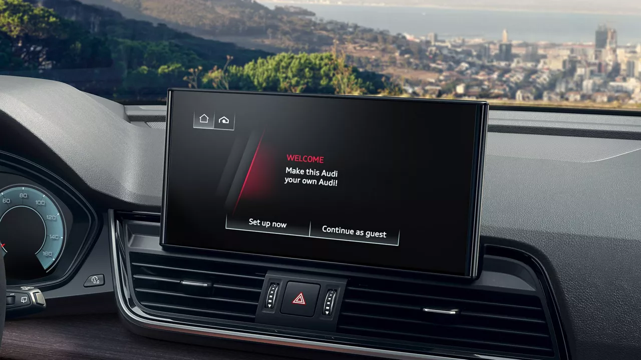 Interior view of an Audi Q5's dashboard screen.