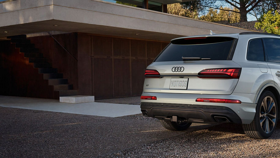 Exterior rear view of an Audi Q7, parked.