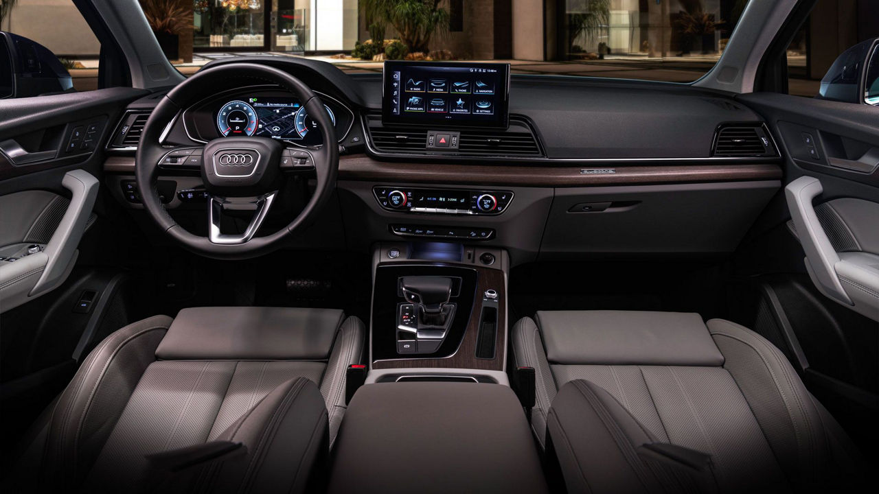 Interior front view of an Audi Q5 dashboard.