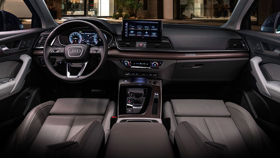 Interior front view of an Audi Q5 dashboard.