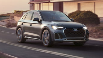 Three quarter view of an Audi Q5 accelerating