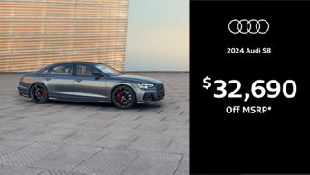 Quarter image of Audi S8 parked by a building