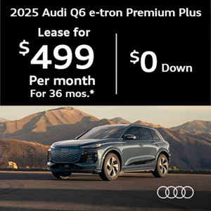 Three quarter view of an Audi Q6 parked