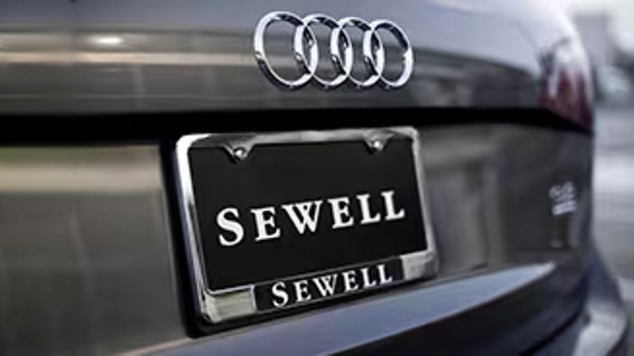 Back of Audi vehicle with Sewell license plate frame.