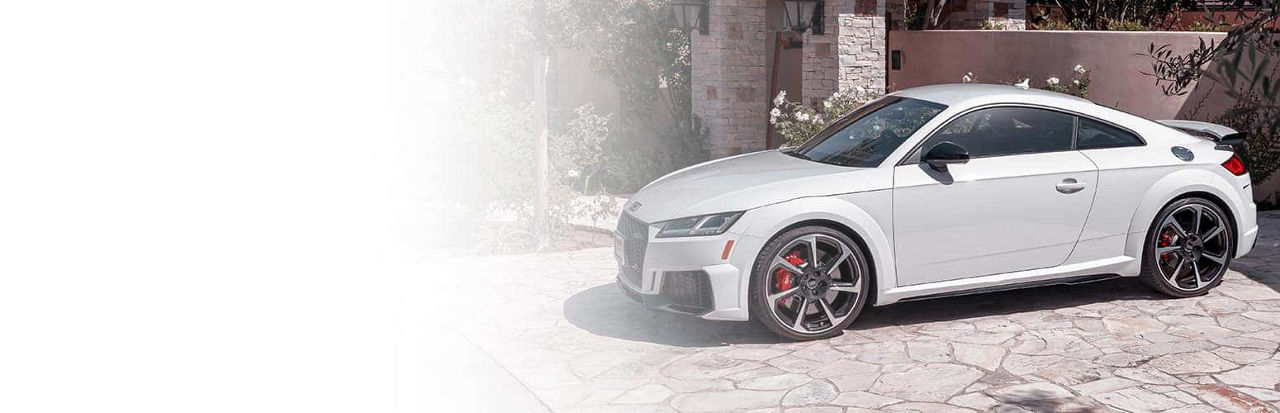 Three quarter view of an Audi Q8 SUV parked.