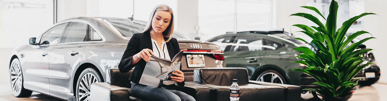 Three quarter view of an Audi Q8 SUV parked.