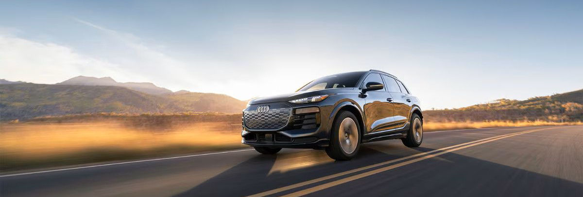 Three quarter view of an Audi Q8 SUV parked.